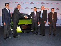 Economie / Véhicules électriques : Mahindra et REVA Electric Car main dans la main