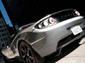 Mondial de Paris 2010 : le bilan du tour du monde en Tesla Roadster TAG Heuer électrique