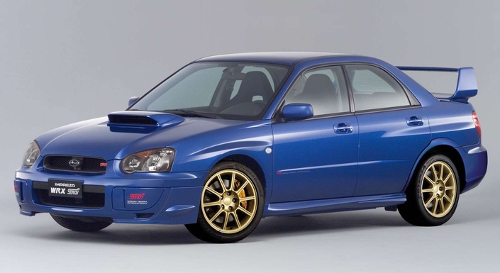 En 2003, l'Impreza WRX STI (désormais codée 8) reçoit le nouvel avant, et adopte d'office le grand aileron arrière, mais le moteur reste à 265 ch.