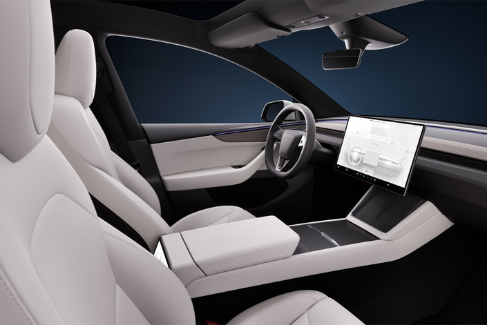 L’intérieur du Model Y passe du blanc au gris.