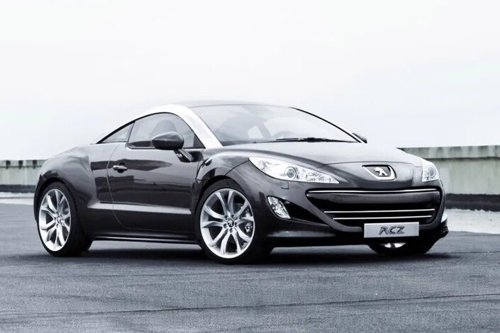 Dans sa déclaration de patrimoine pré-électorale, le futur candidat avait indiqué posséder un coupé sportif Peugeot RCZ acquis en 2013 - Crédit Peugeot Media