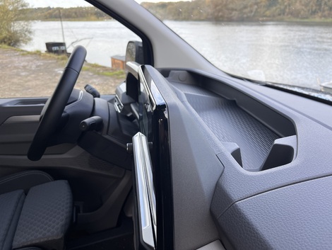 Une aumônière au-dessus de la planche de bord…