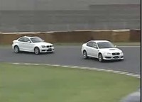 Vidéo : Battle Mitsubishi Evo X VS Porsche Cayman S VS BMW 135i ...
