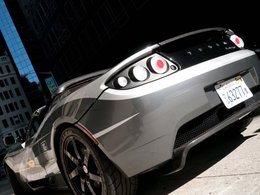 Mondial de Paris 2010 : le bilan du tour du monde en Tesla Roadster TAG Heuer électrique